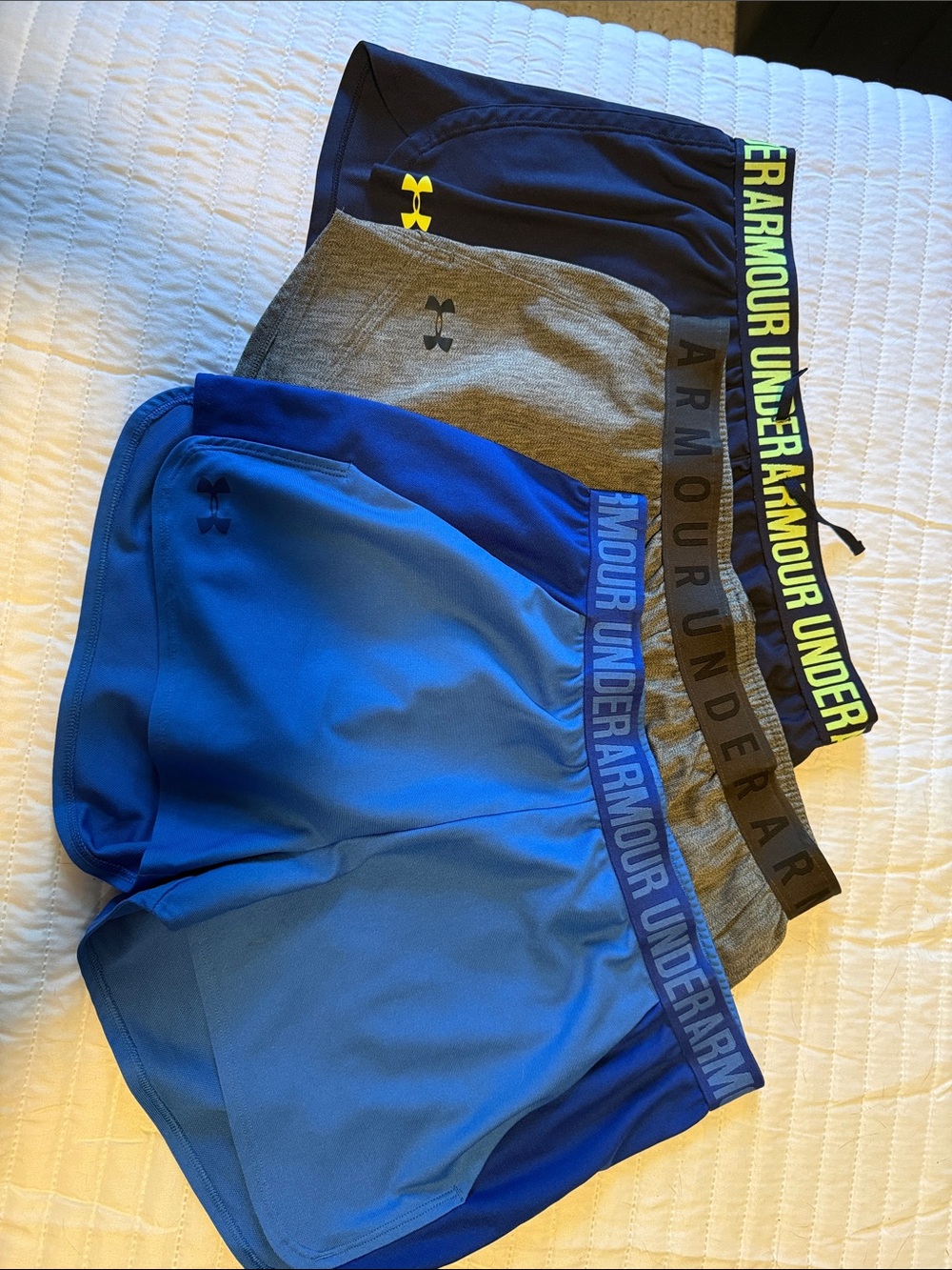 Under Armour Three-Pack Athletic Shorts in Royal Blue, Gray, Black